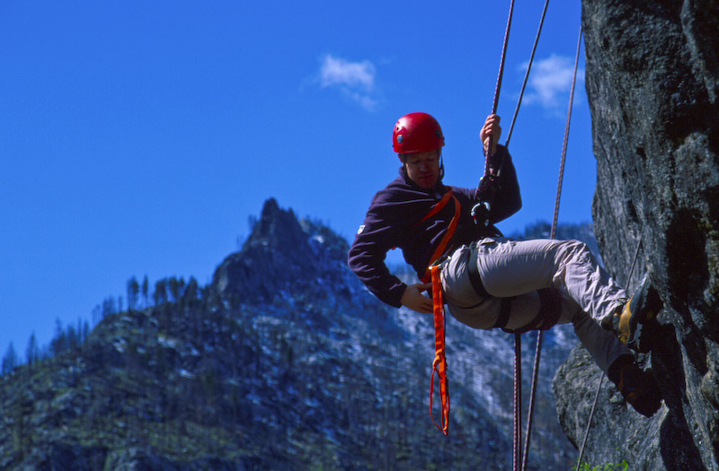 Climber Rappelling